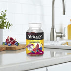 Airborne 750mg Vitamin C Gummies For Adults, Immune Support Supplement with Powerful Antioxidants Vitamins A C & E - 63 Gummies, Blueberry Pomegranate Flavor