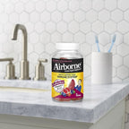 Airborne 750mg Vitamin C Gummies For Adults, Immune Support Supplement with Powerful Antioxidants Vitamins A C & E - 63 Gummies, Blueberry Pomegranate Flavor